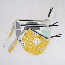 Load image into Gallery viewer, Set of fabric pouches with geometric patterns on a light gray background Brooke Wristlet Sewing Pattern PDF