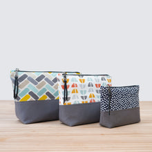 Load image into Gallery viewer, Three pouches with geometric patterns on a wooden surface pfd sewing pattern Molko Studios