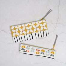 Load image into Gallery viewer, Two patterned pouches with zippers on a light gray surface Athena Pencil Case Sewing Pattern PDF

