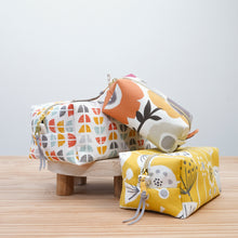Load image into Gallery viewer, Three fabric pouches with different patterns on a wooden surface. Demi Boxy Bag Sewing Pattern PDF
