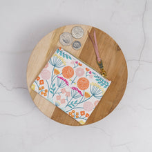Load image into Gallery viewer, Floral-patterned pouch with coins on a wooden surface Esmee Zipper Pouch Sewing Pattern PDF

