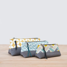 Load image into Gallery viewer, Three fabric pouches with different patterns on a wooden surface pfd sewing pattern Molko Studios

