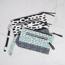 Load image into Gallery viewer, Three pouches with different patterns on a light gray background Ria Wristlet Sewing Pattern PDF
