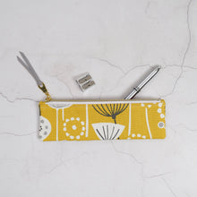 Load image into Gallery viewer, Yellow pencil case with floral pattern on a light gray surface Tasnim Pencil Case Sewing Pattern PDF
